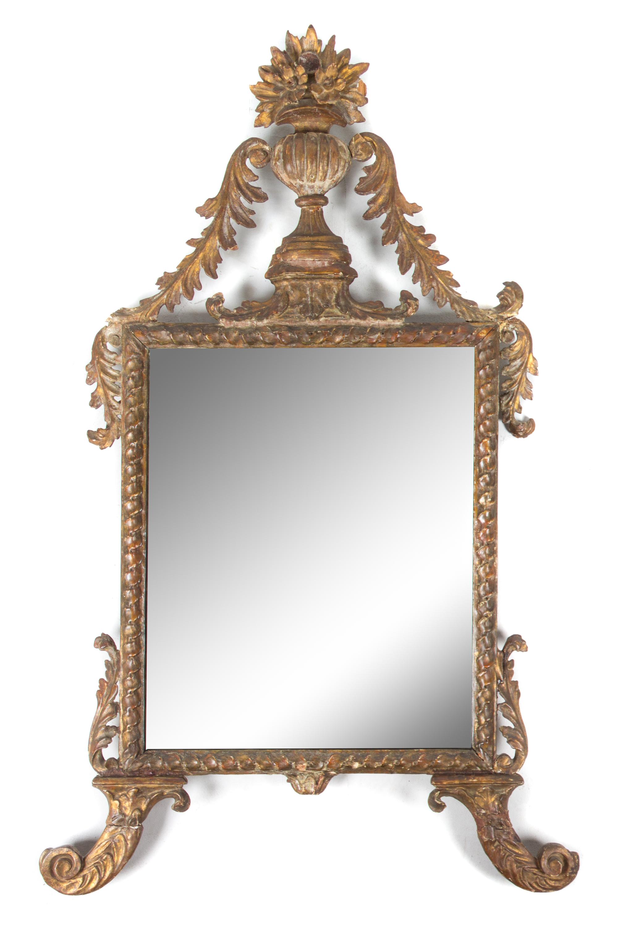 An Italian Giltwood Mirror Height 48 x width 29 inches. — 18TH CENTURY
