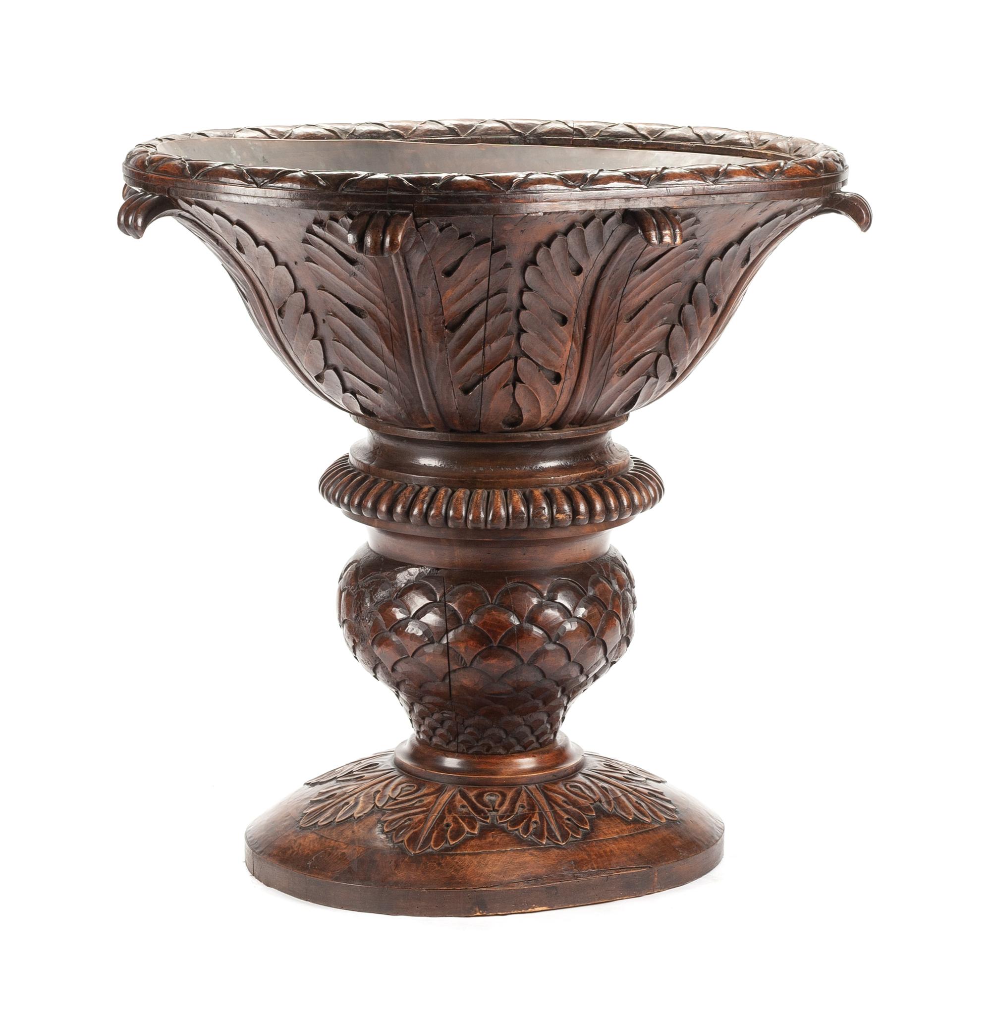 A Large Continental Carved Jardiniere Height 41 x width 43 inches. — 19TH CENTURY