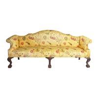 A Chippendale Style Carved Mahogany Camelback Sofa