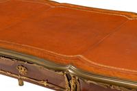 A Louis XV Style Gilt Bronze Mounted Kingwood Bureau Plat