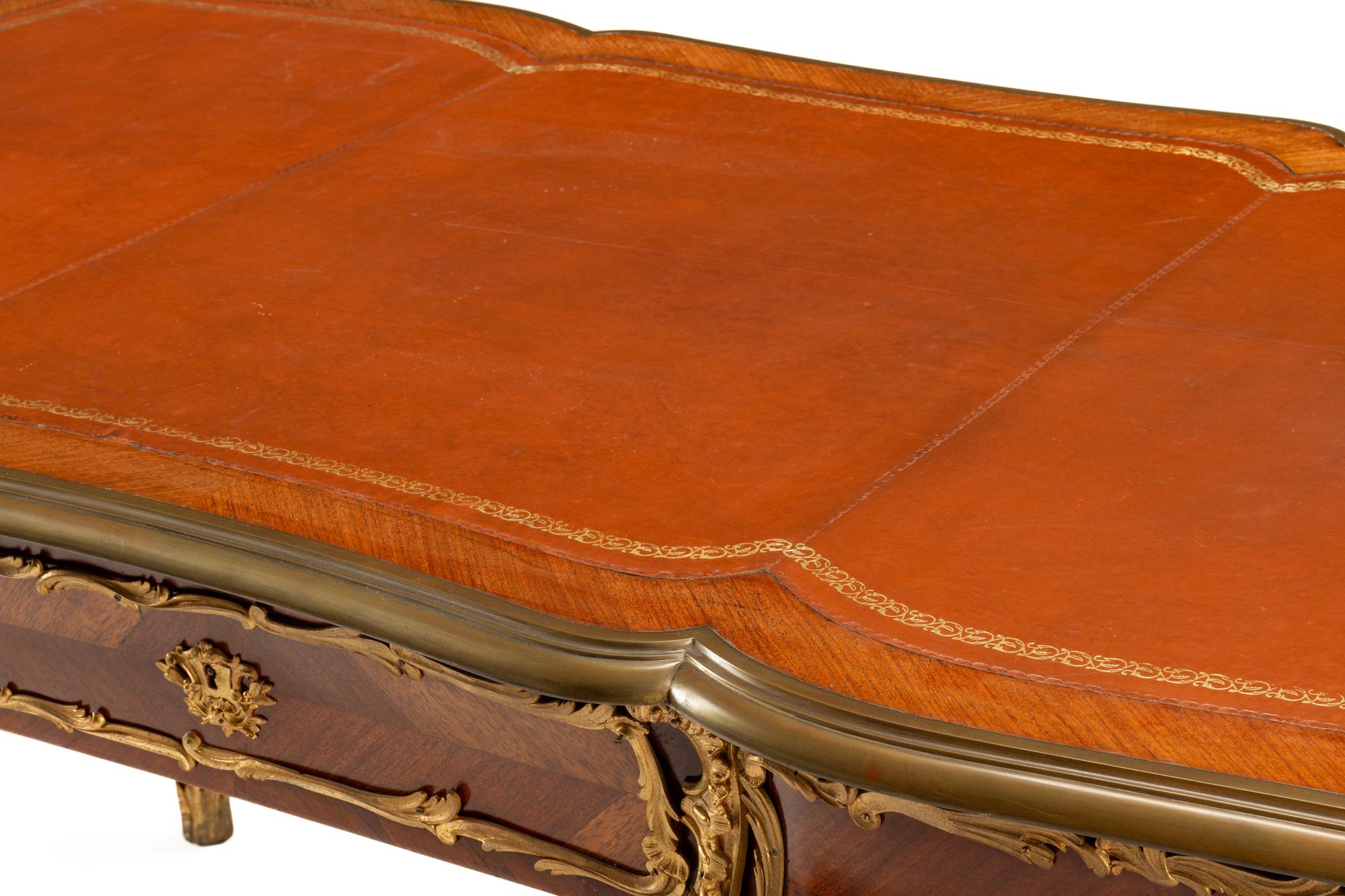 A Louis XV Style Gilt Bronze Mounted Kingwood Bureau Plat