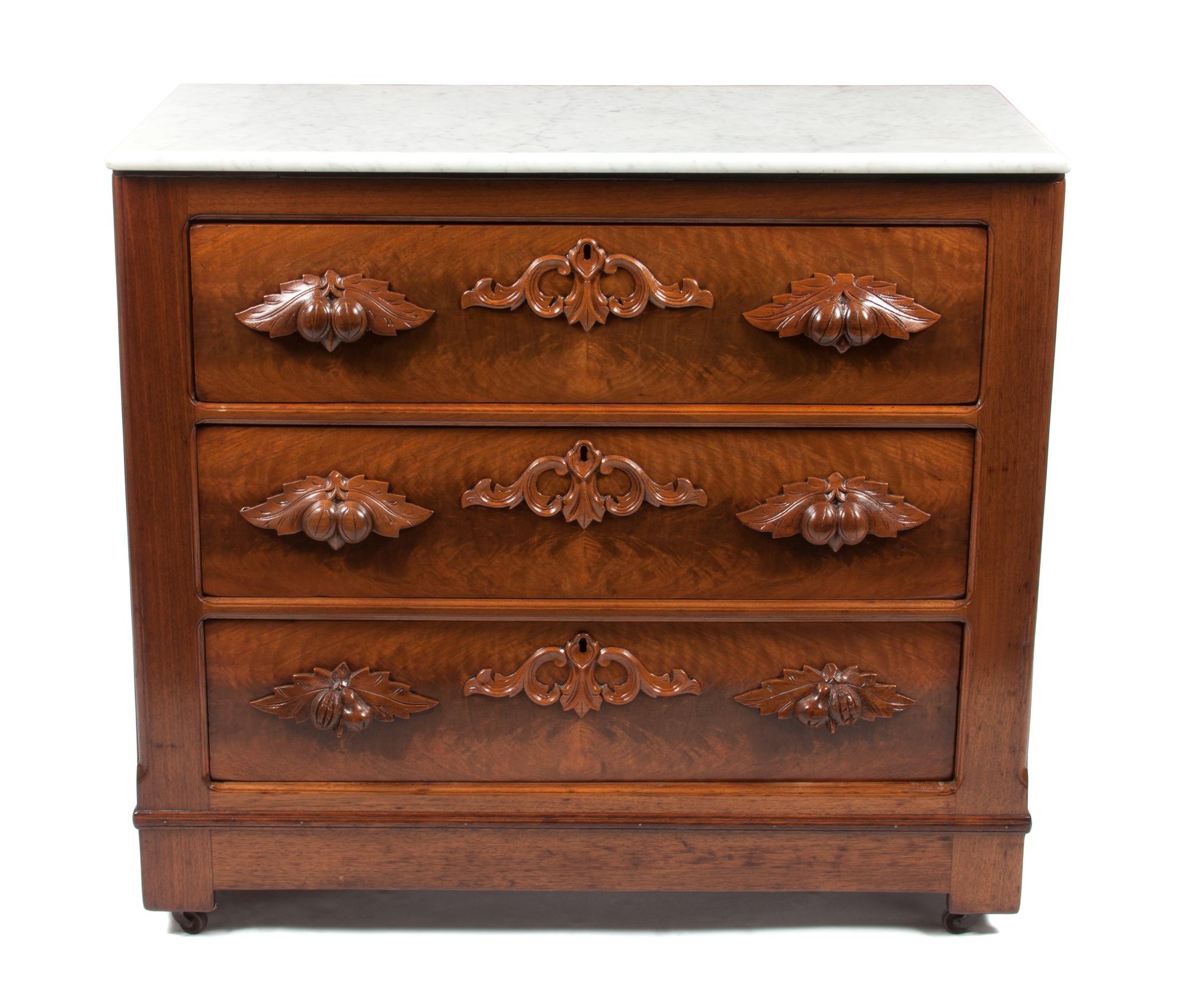 A Victorian Walnut Chest of Drawers Height 33 1/4 x width 38 x depth 18 inches. — 19TH CENTURY