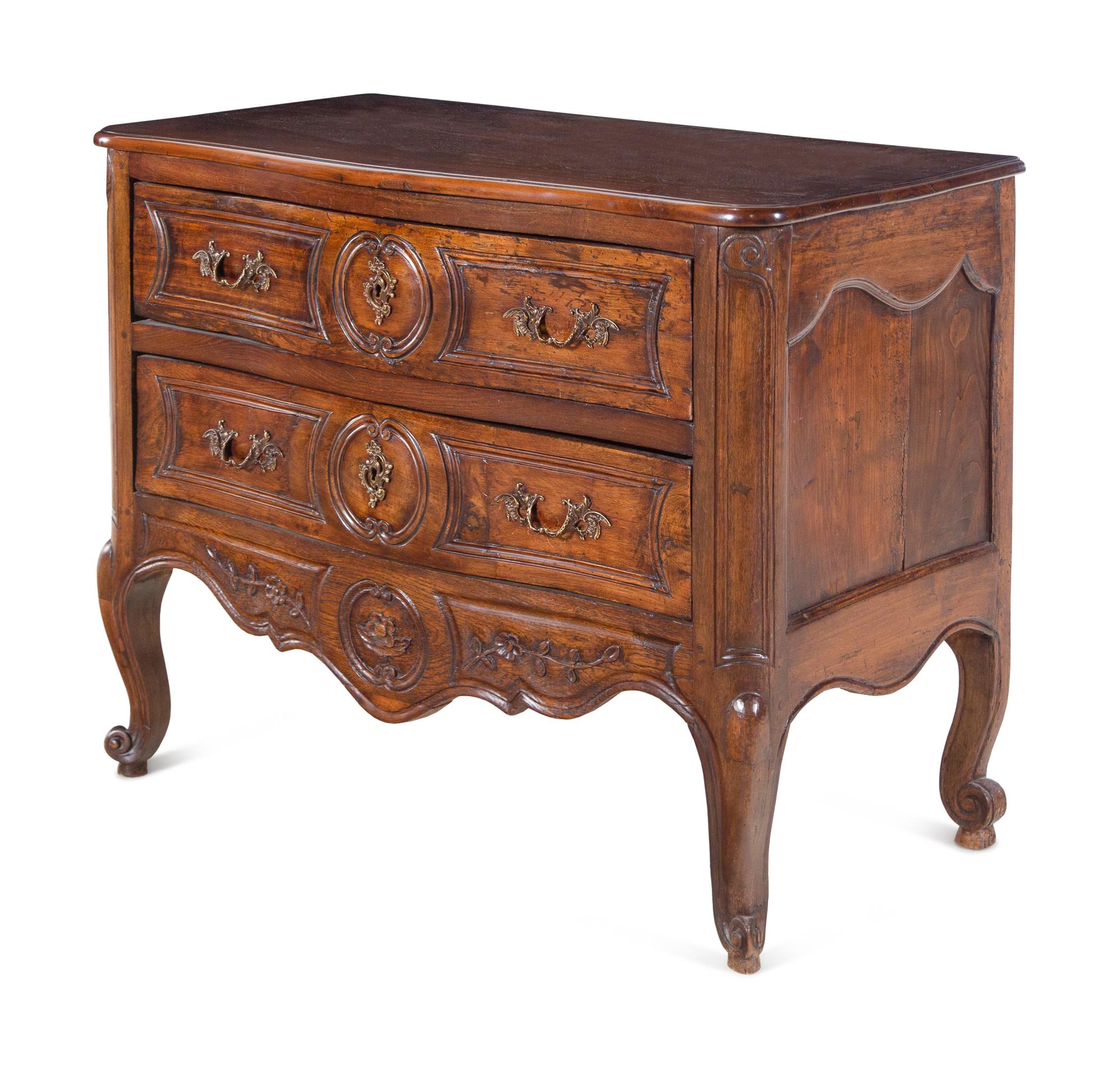 A Provincial Louis XV Walnut Commode