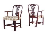 A Pair of George III Carved Mahogany Armchairs