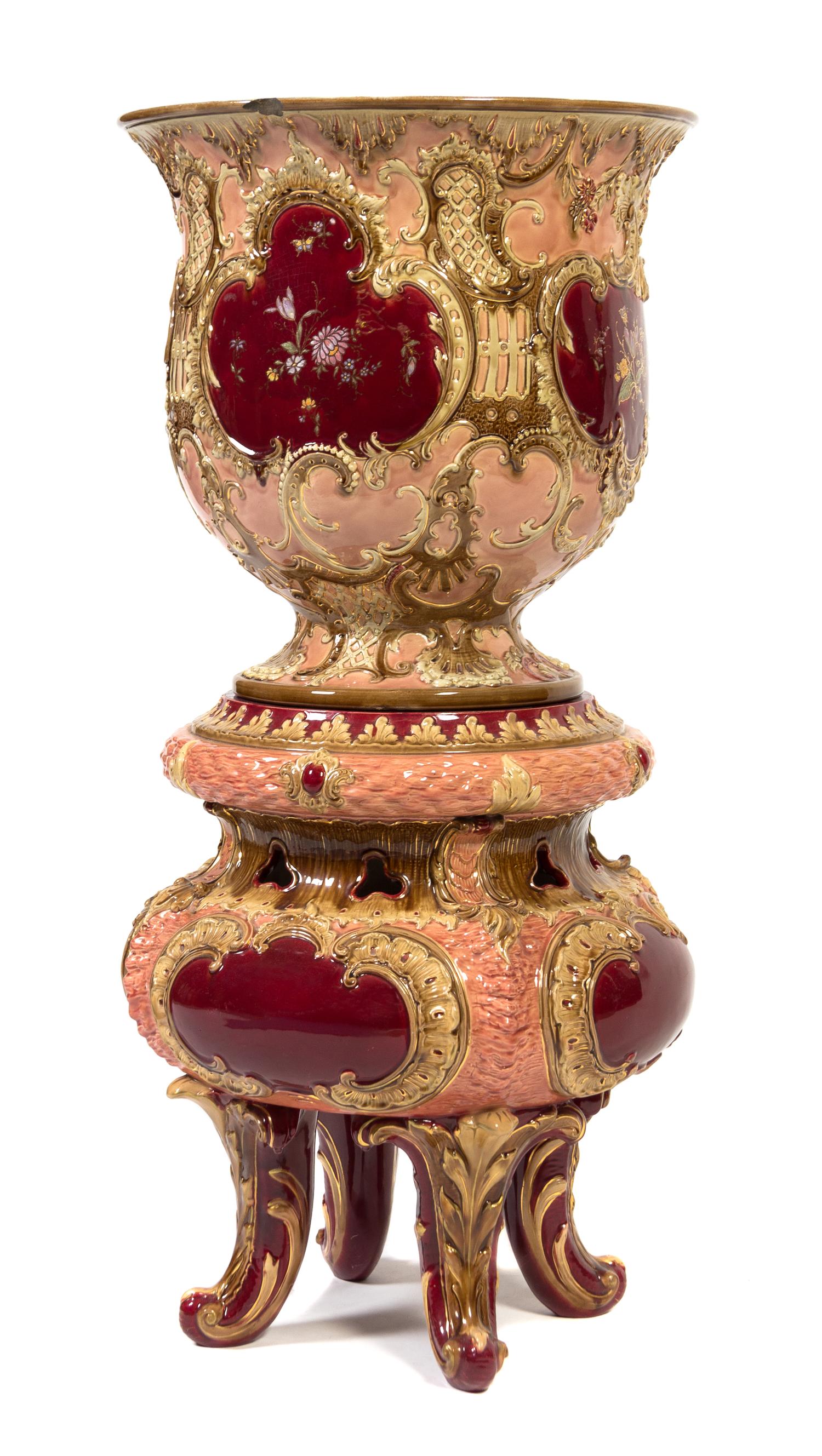 A Continental Majolica Jardiniere and Pedestal Height overall 42 inches.