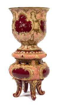 A Continental Majolica Jardiniere and Pedestal Height overall 42 inches.