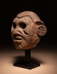 A Maya Terracotta Face Mask