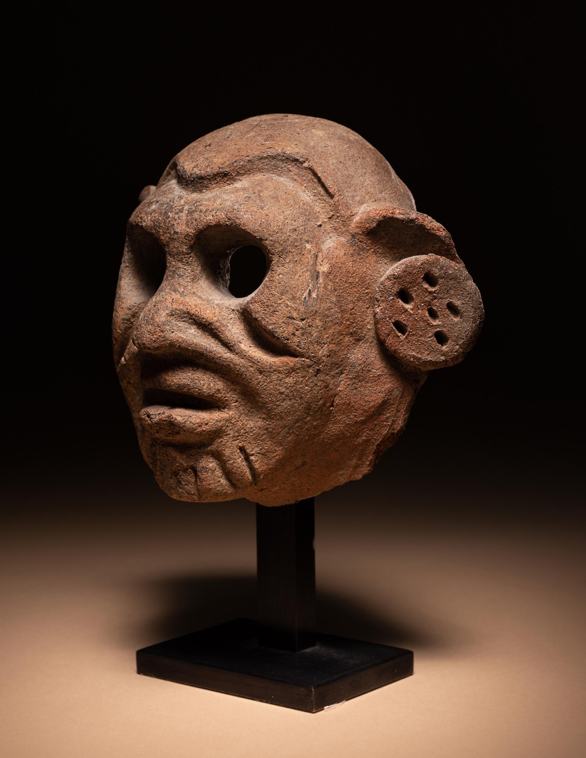 A Maya Terracotta Face Mask