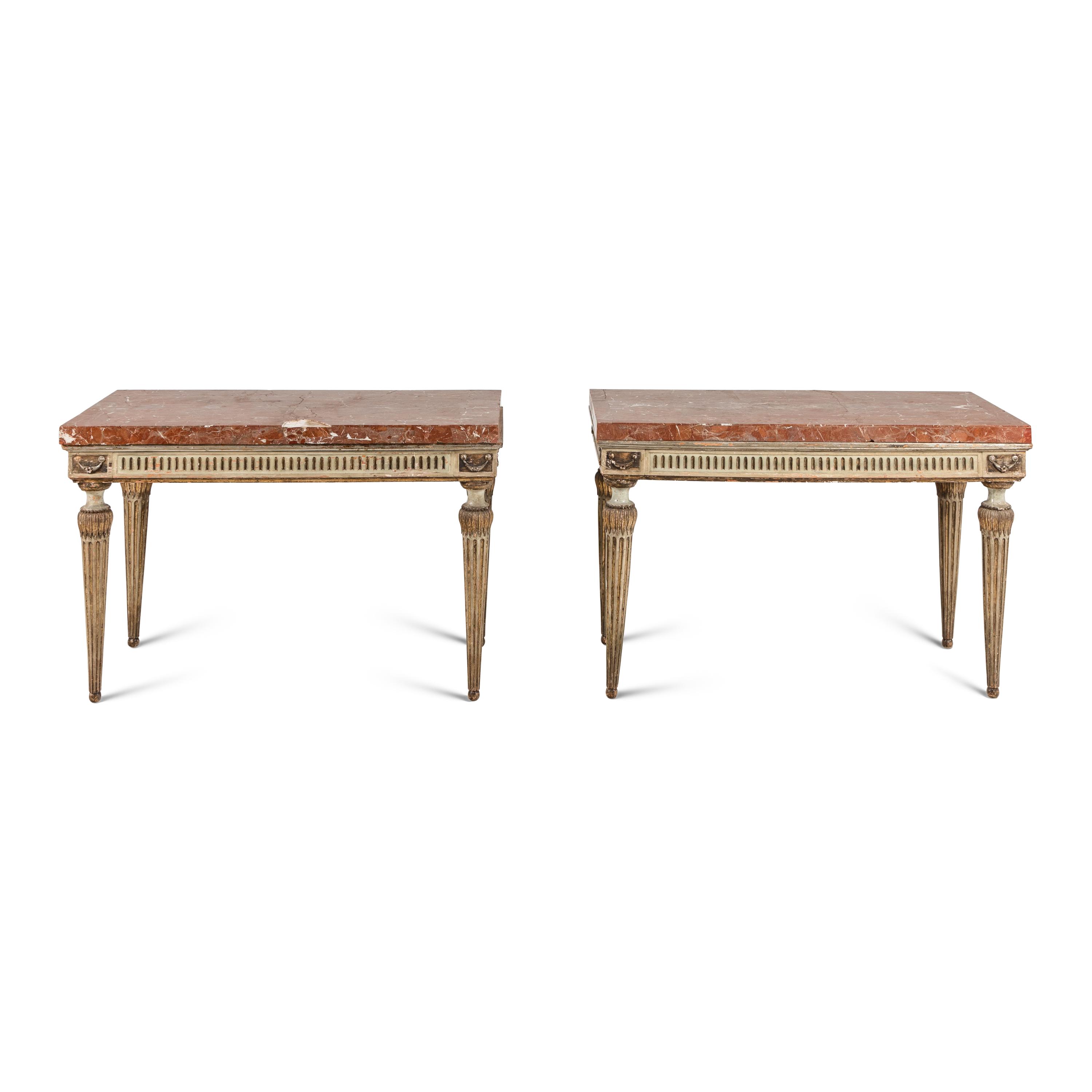 A Pair of Italian Neoclassical Painted and Parcel Gilt Marble-Top Console Tables