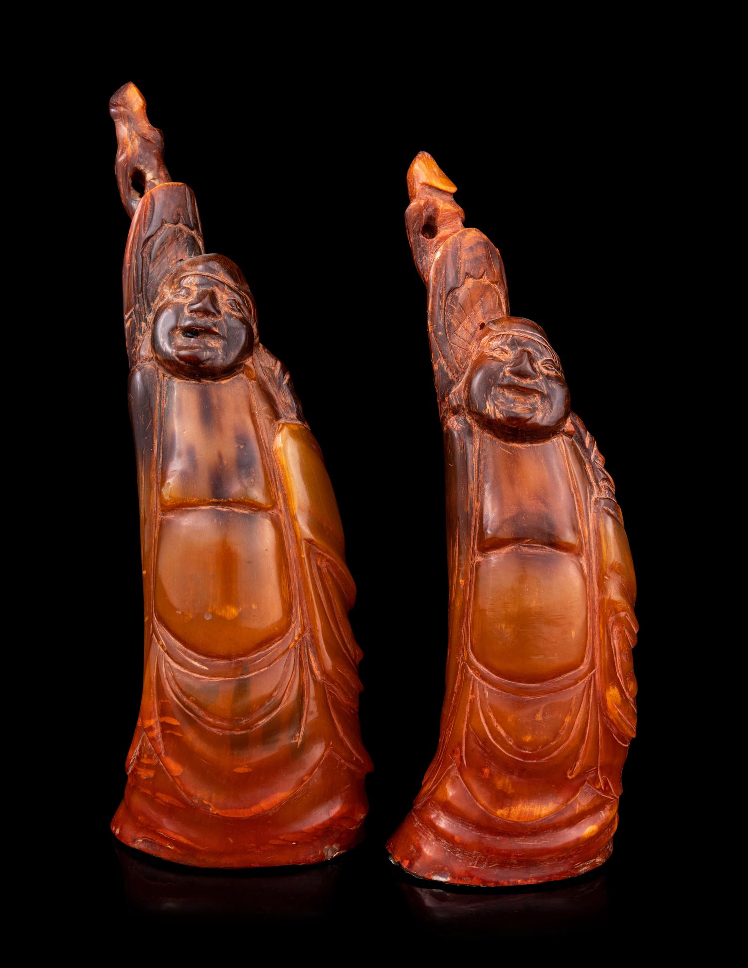 A Pair of Chinese Carved Buffalo Horn Figures