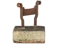A Wrought Iron Boot Scrape with Stone Base