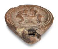 A Roman Terracotta Oil Lamp with Two Women