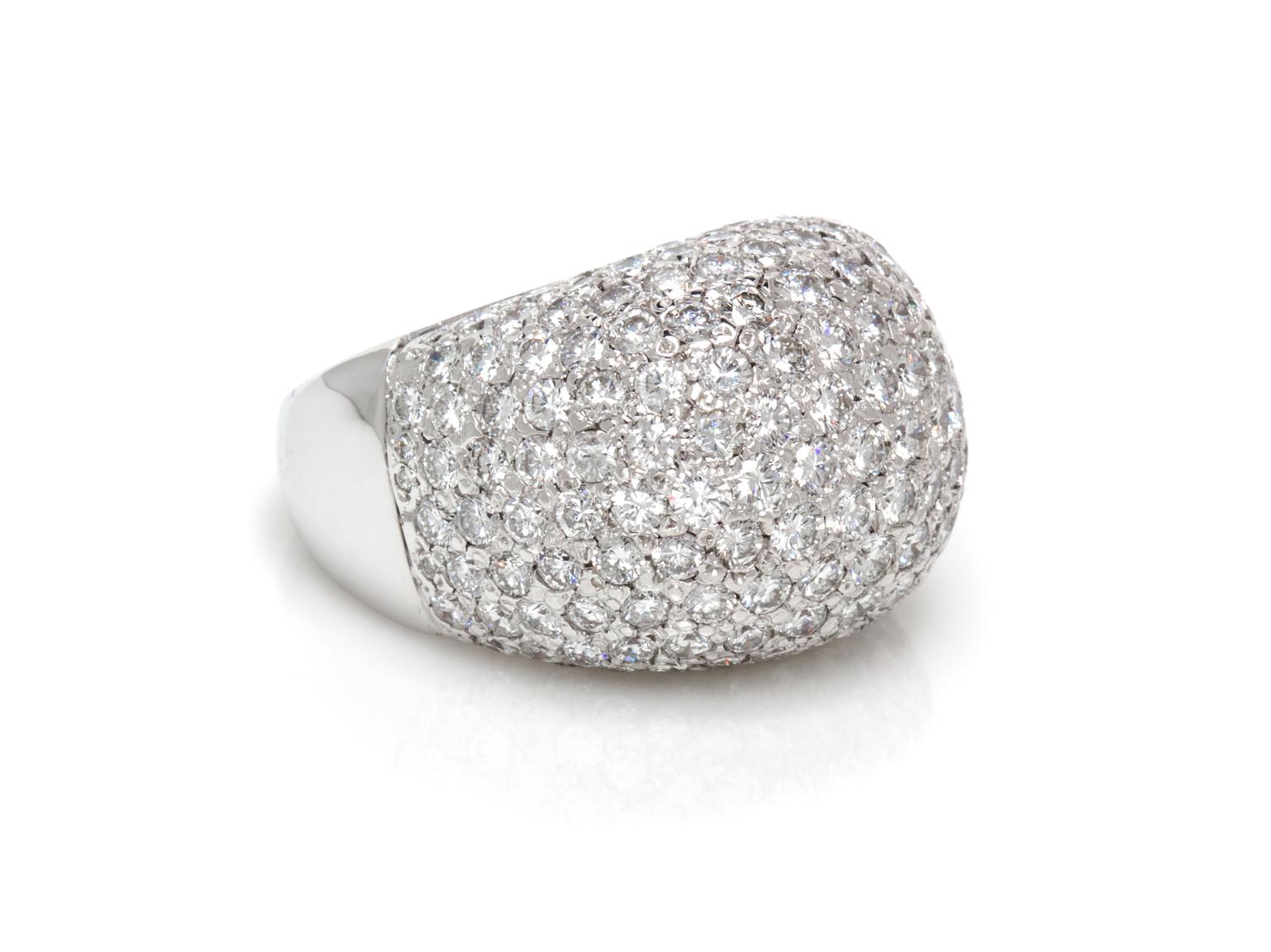 A 14 Karat White Gold and Diamond Dome Ring, 18.00 dwts.