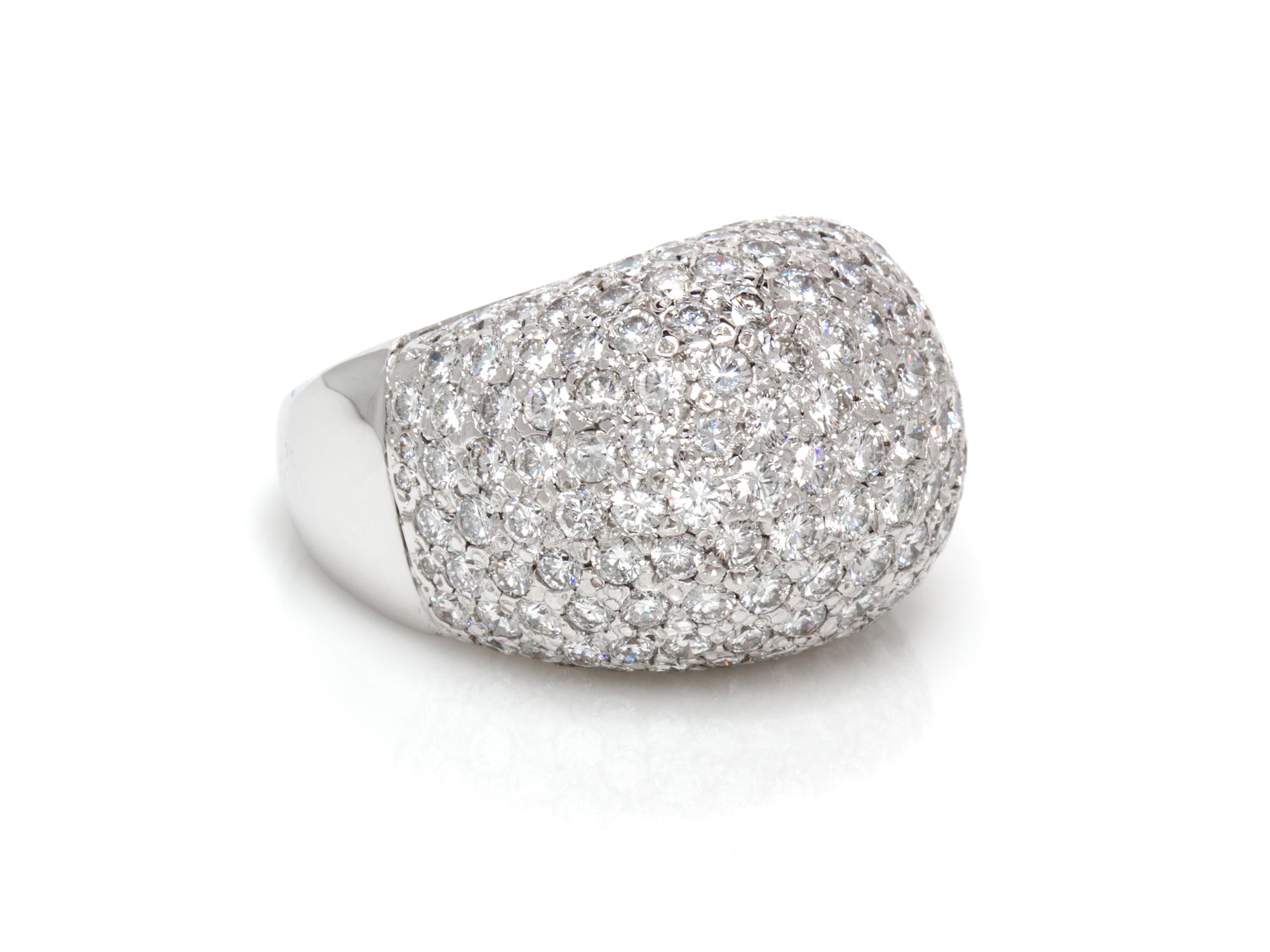 A 14 Karat White Gold and Diamond Dome Ring, 18.00 dwts.