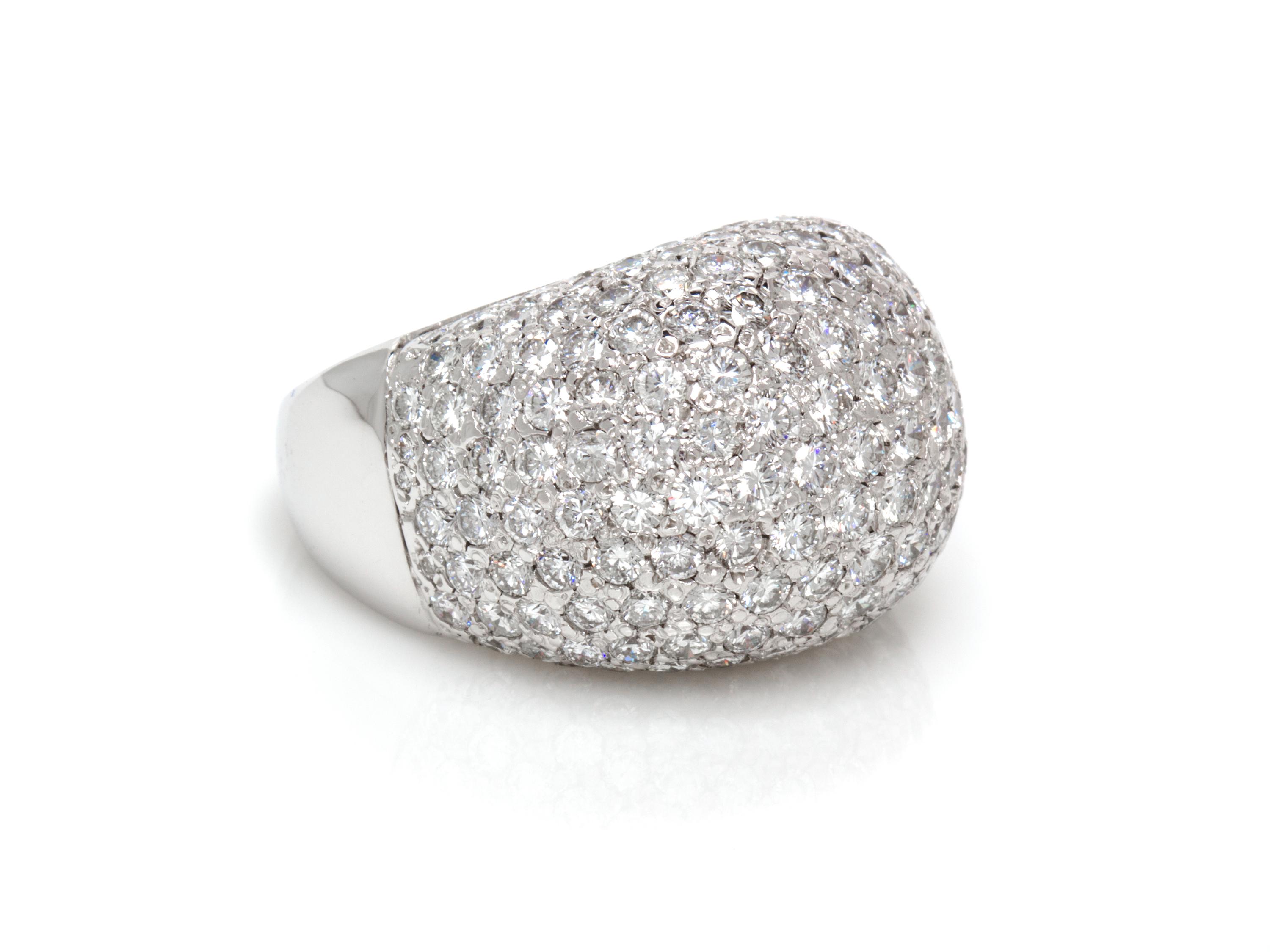 A 14 Karat White Gold and Diamond Dome Ring, 18.00 dwts.