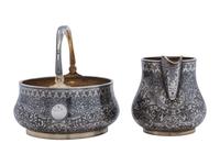 A Russian Niello Inlaid Silver Four-Piece Serving Set