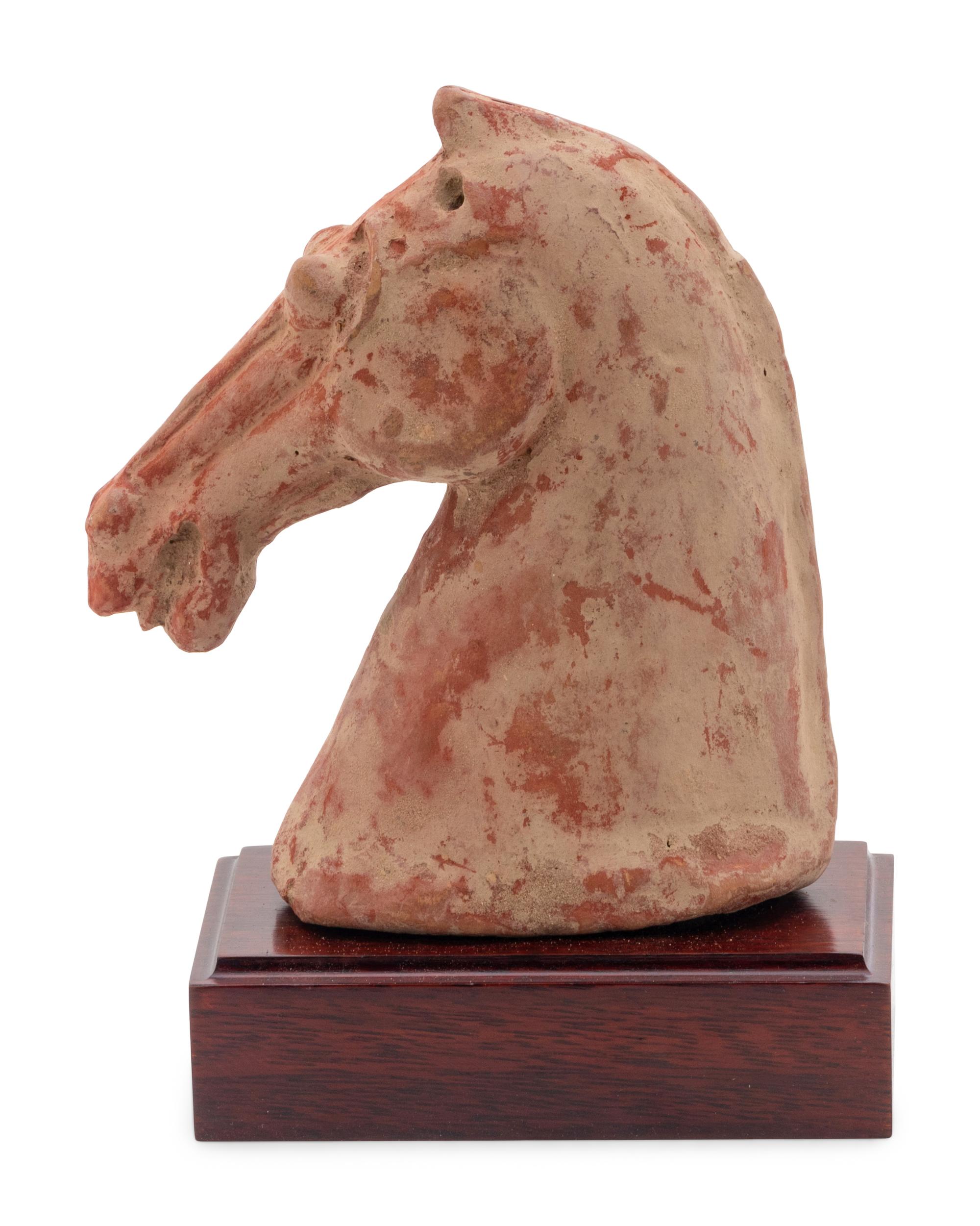 A Chinese Red Pottery Head of a Horse