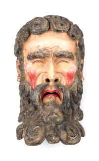 A Mexican Polychromed Wood Mask Height 19 inches.