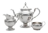An American Silver Three-Piece Tea Service, Gorham Mfg. Co., Providence, RI, Puritan pattern, comprising a teapot, creamer and sugar.