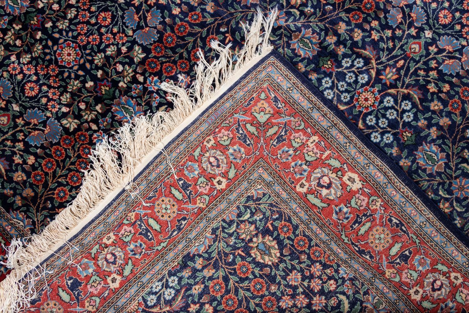 A Hereke Wool Rug