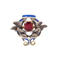 FRENCH, ANTIQUE, GARNET AND ENAMEL CHERUB BROOCH