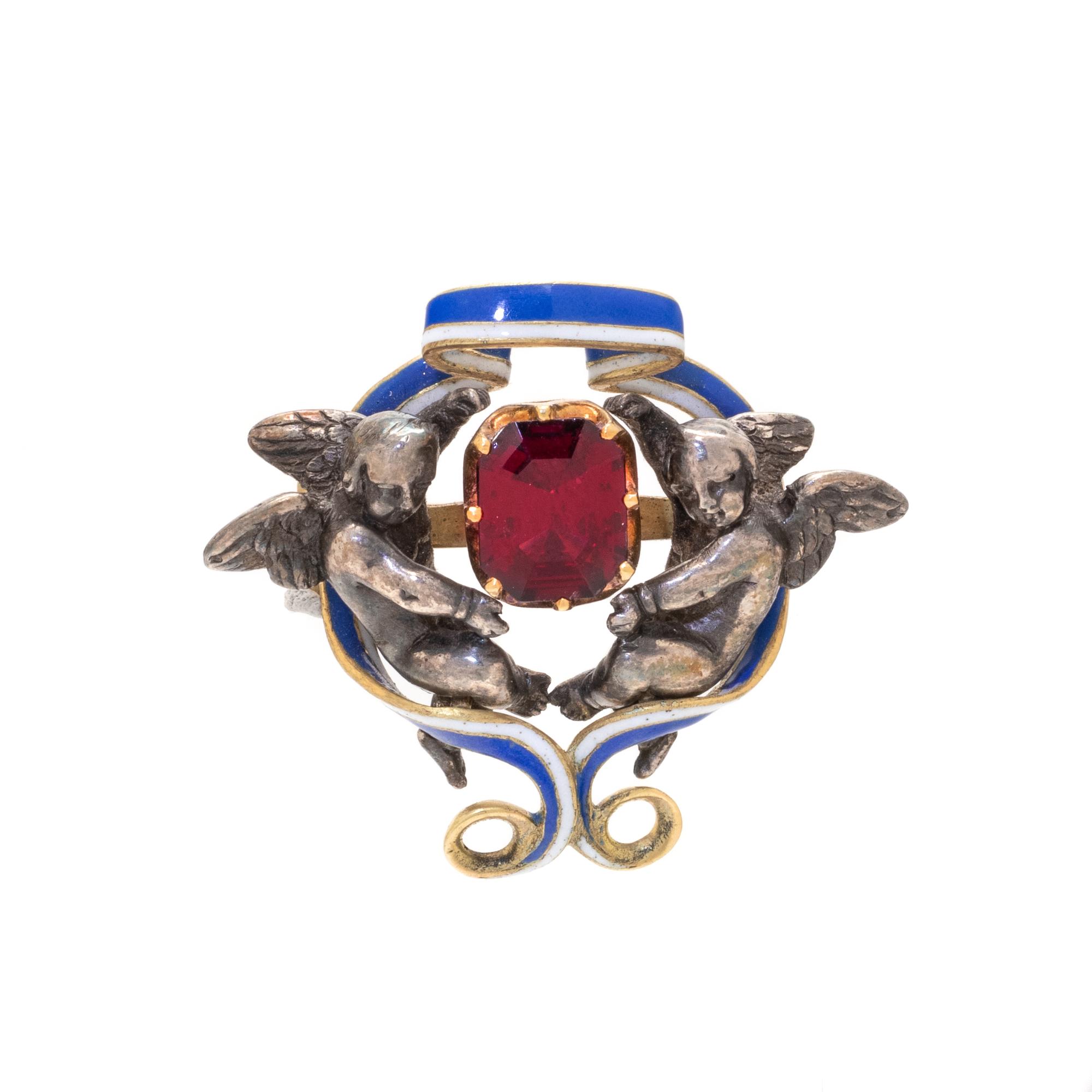 FRENCH, ANTIQUE, GARNET AND ENAMEL CHERUB BROOCH