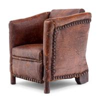 A Diminutive Leather Upholstered Club Chair