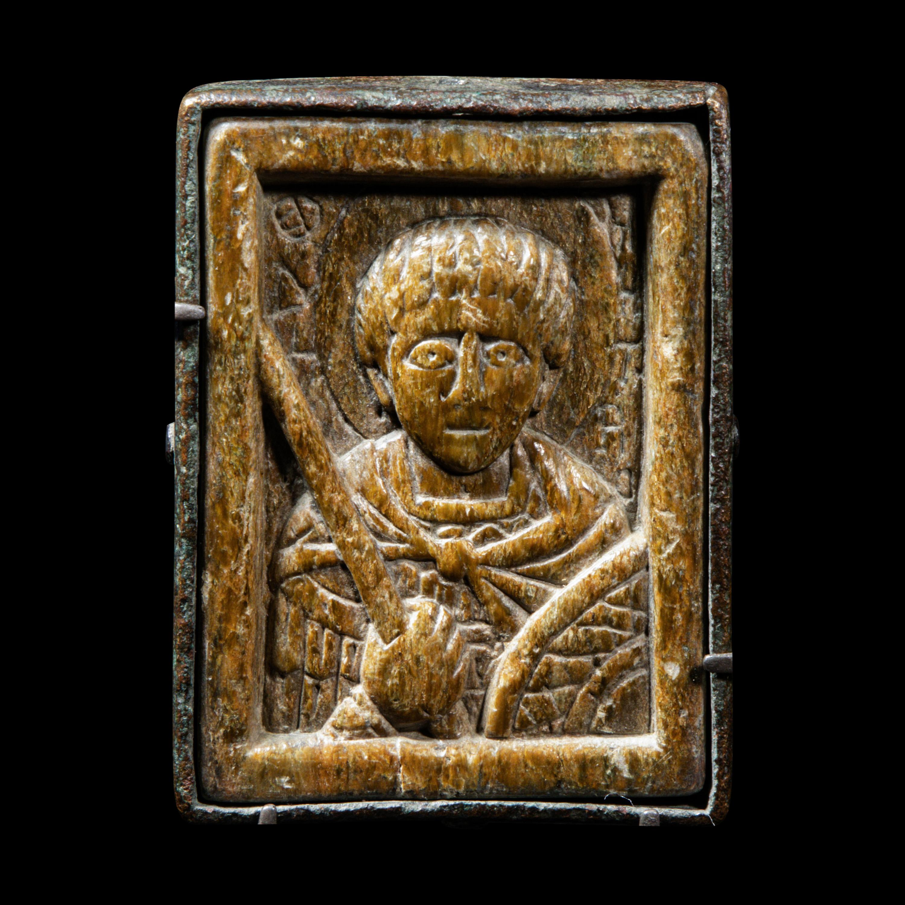 A Byzantine Bronze and Steatite Plaque with Saint Demetrios