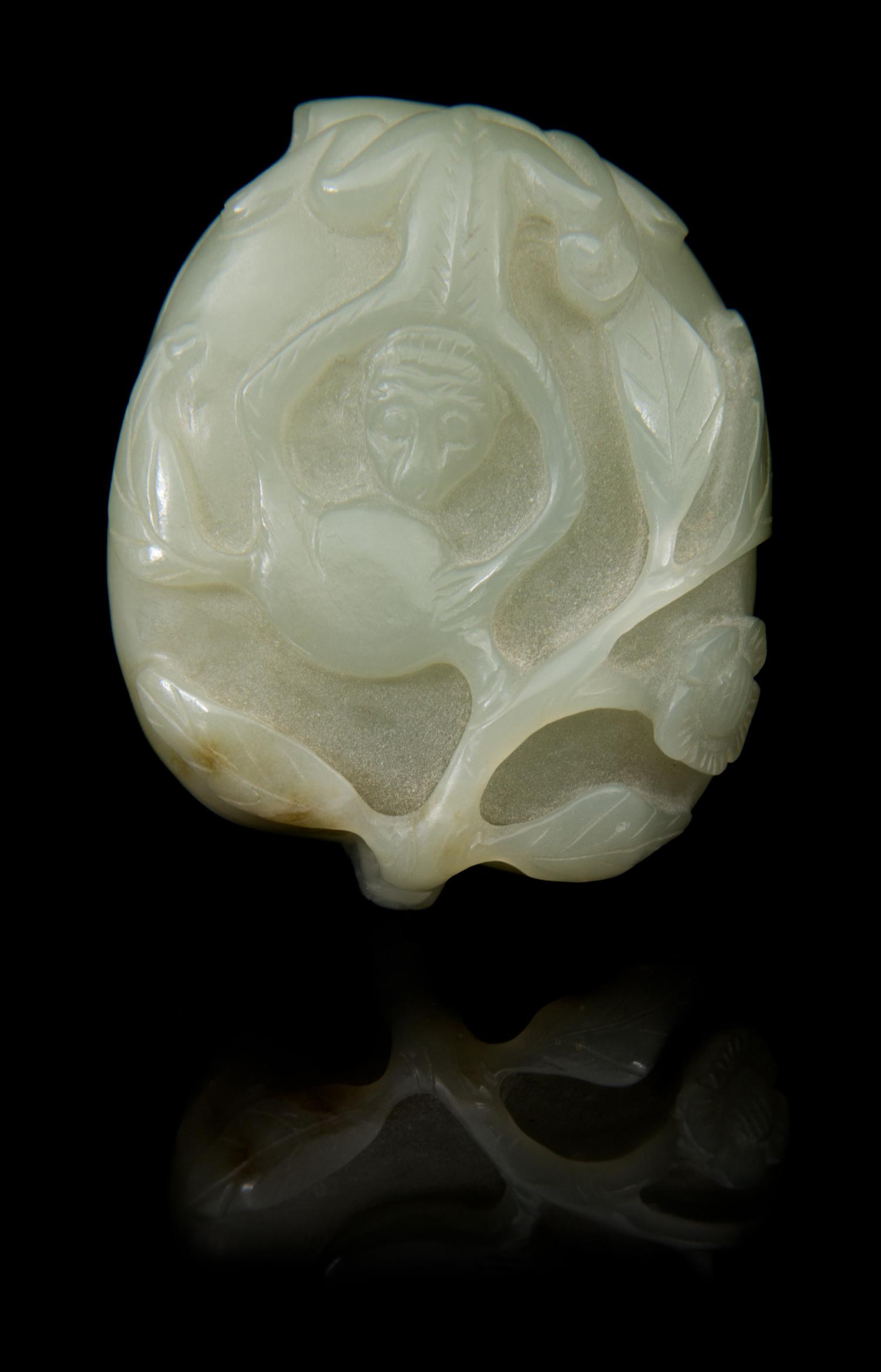 A Carved Jade Box and Cover Length 2 3/8 inches.