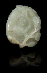 A Carved Jade Box and Cover Length 2 3/8 inches.
