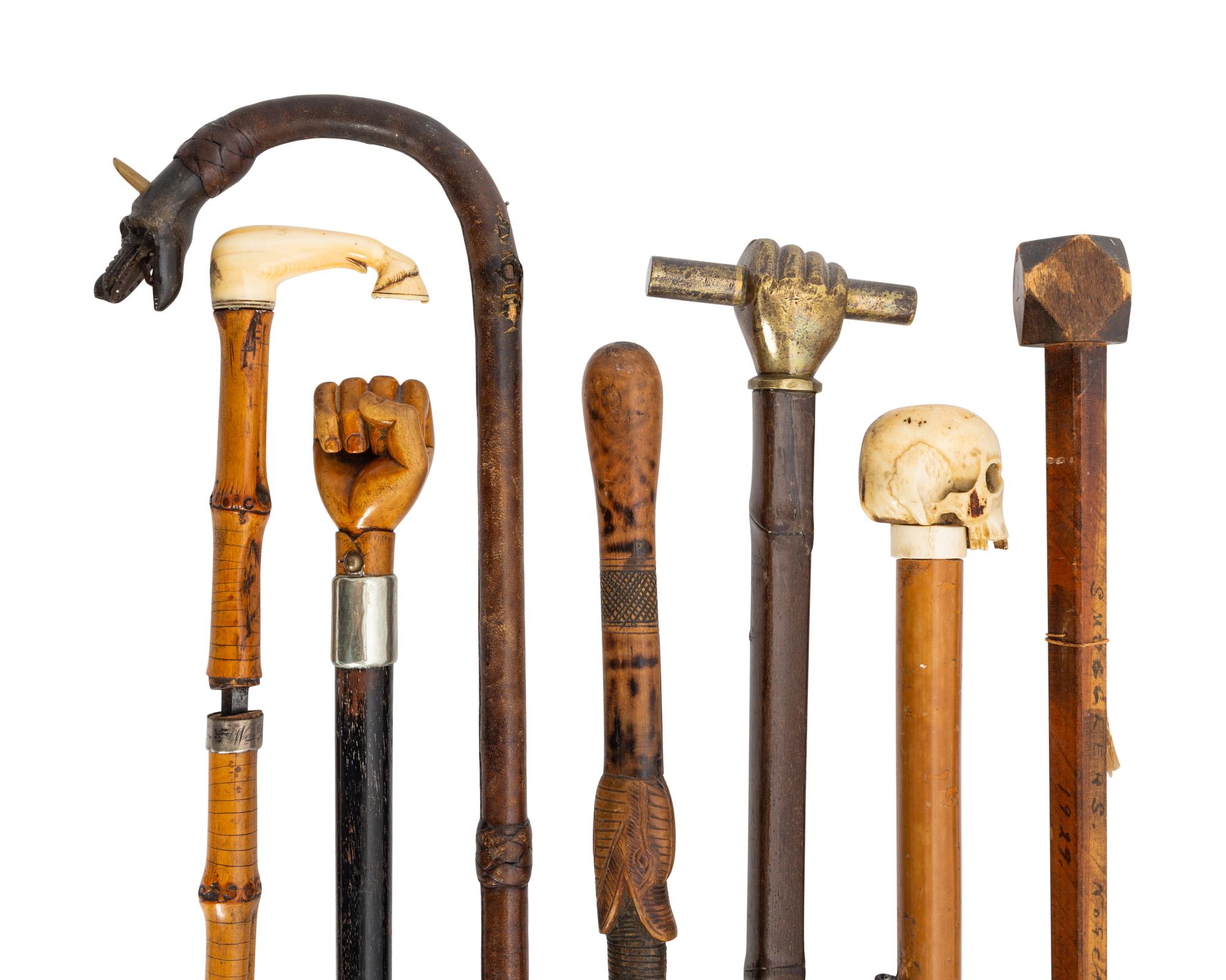 A Group of Folk Art Carved Canes