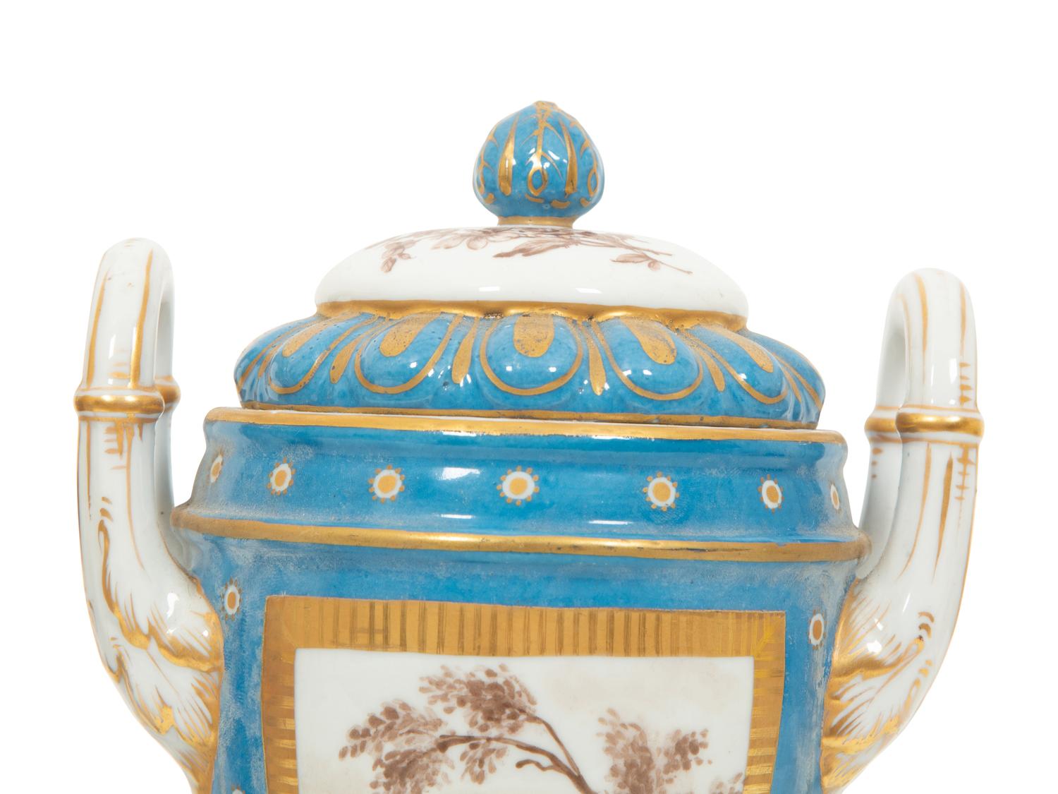 A Pair of S è vres Style Porcelain Covered Urns