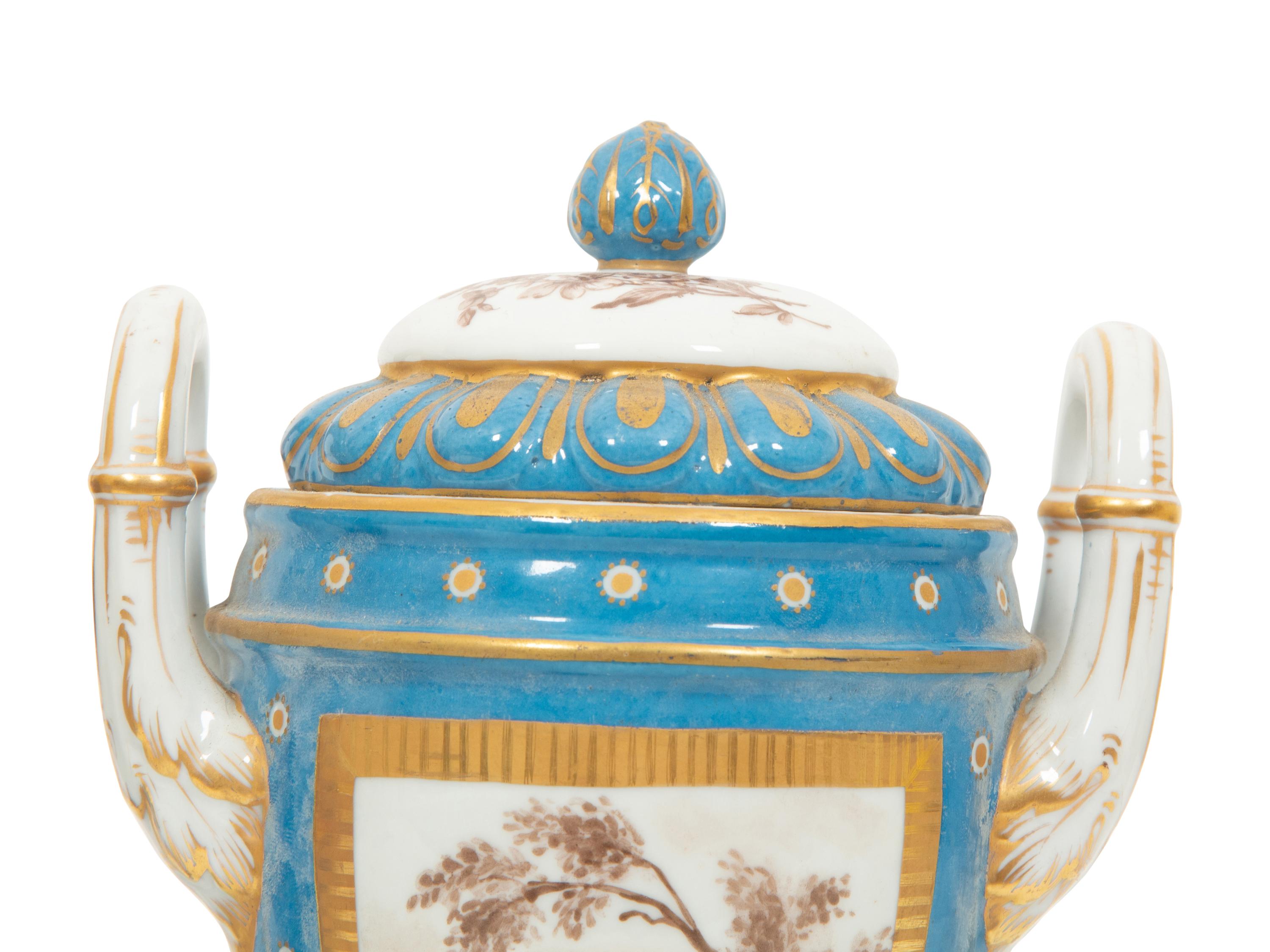 A Pair of S è vres Style Porcelain Covered Urns