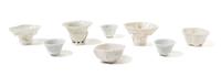 Eight Blanc-de-Chine Porcelain Wine and Libation Cups — QING DYNASTY