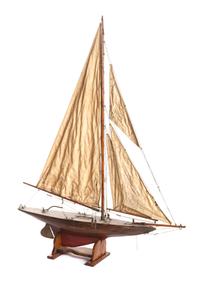 A Brass Mounted Painted Wood Pond Boat