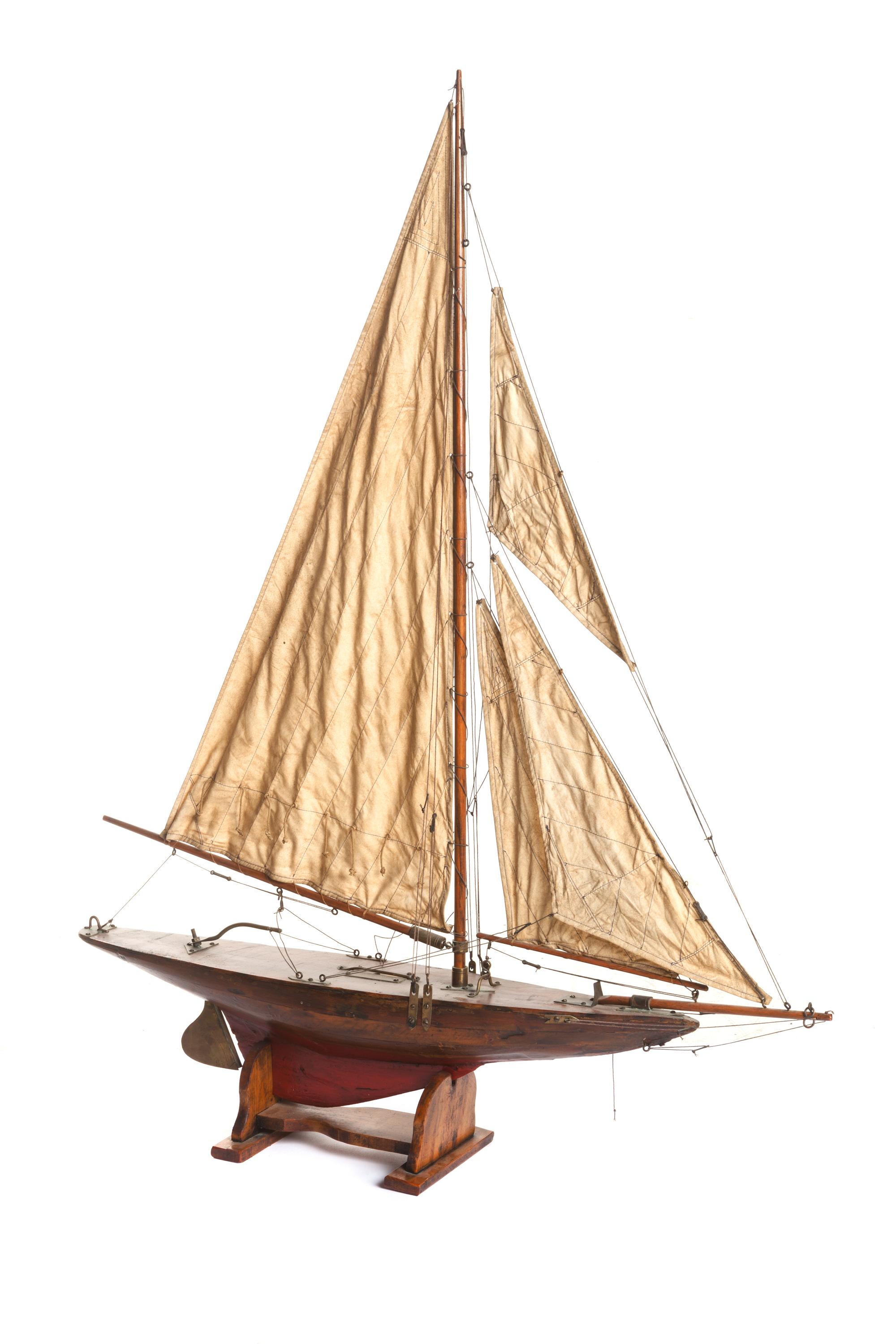 A Brass Mounted Painted Wood Pond Boat