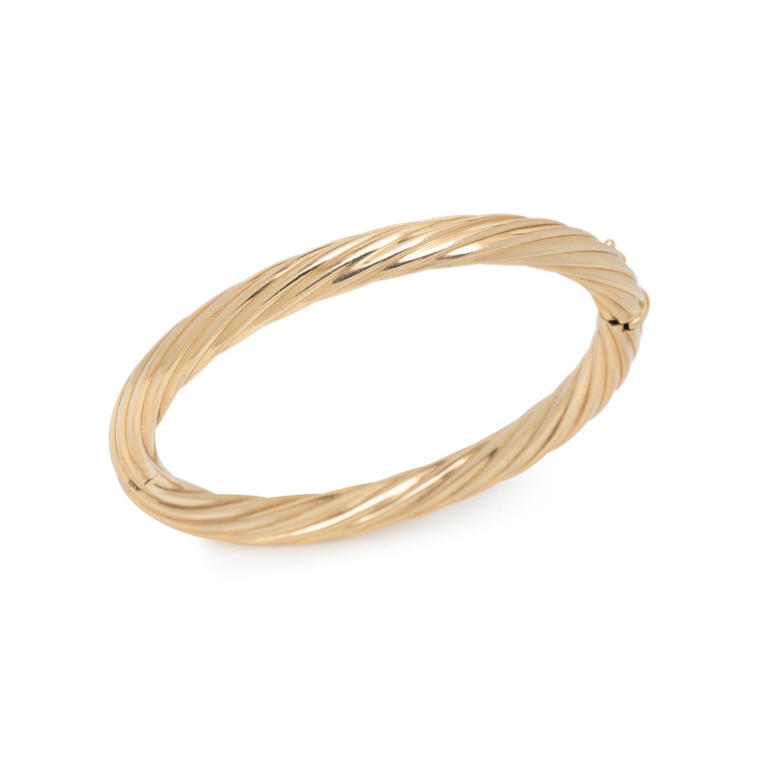 TIFFANY & CO., YELLOW GOLD TWIST BANGLE BRACELET