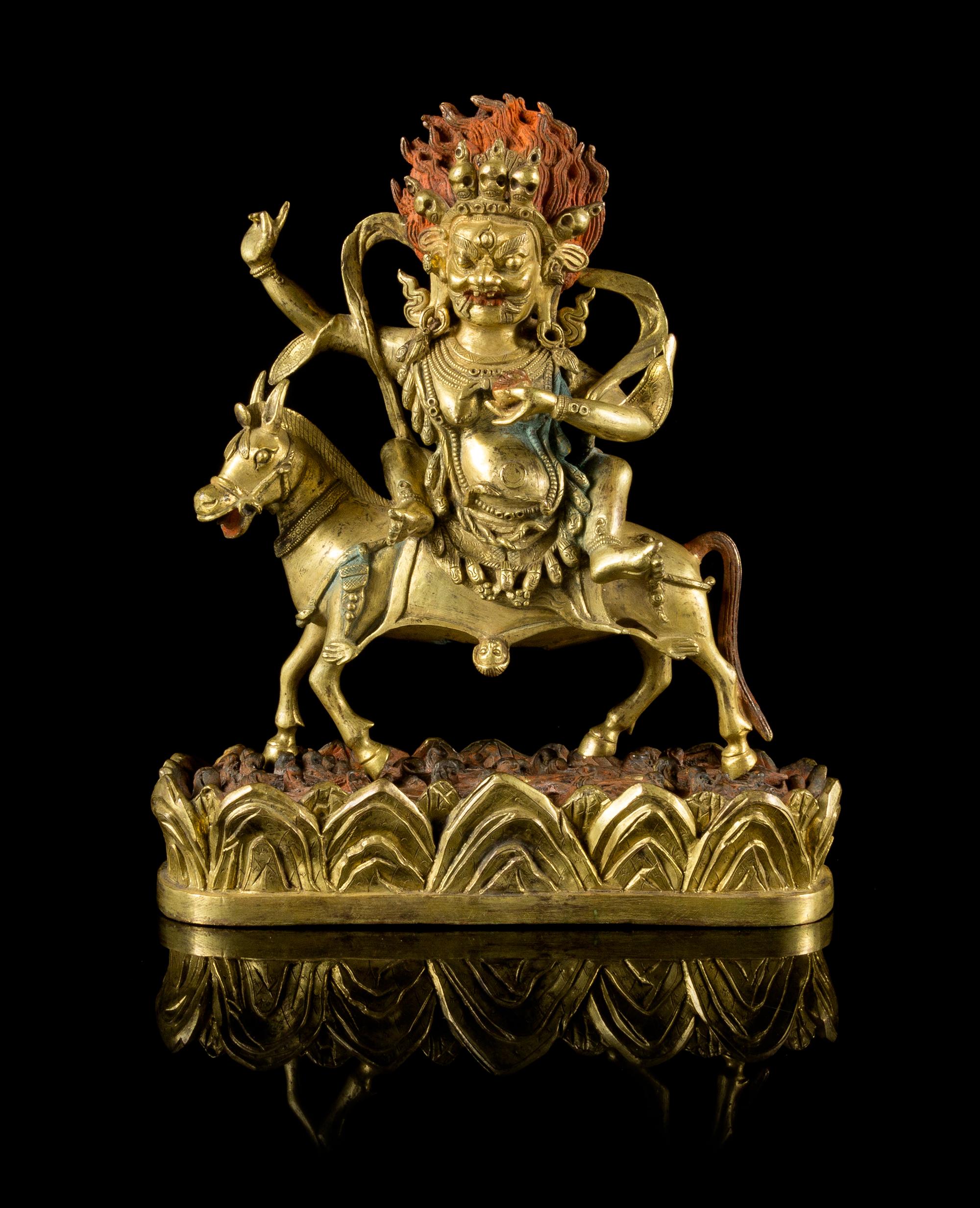 A Sino-Tibetan Gilt Bronze Figure of a Bodhisattva Height of 10 3/4 inches.