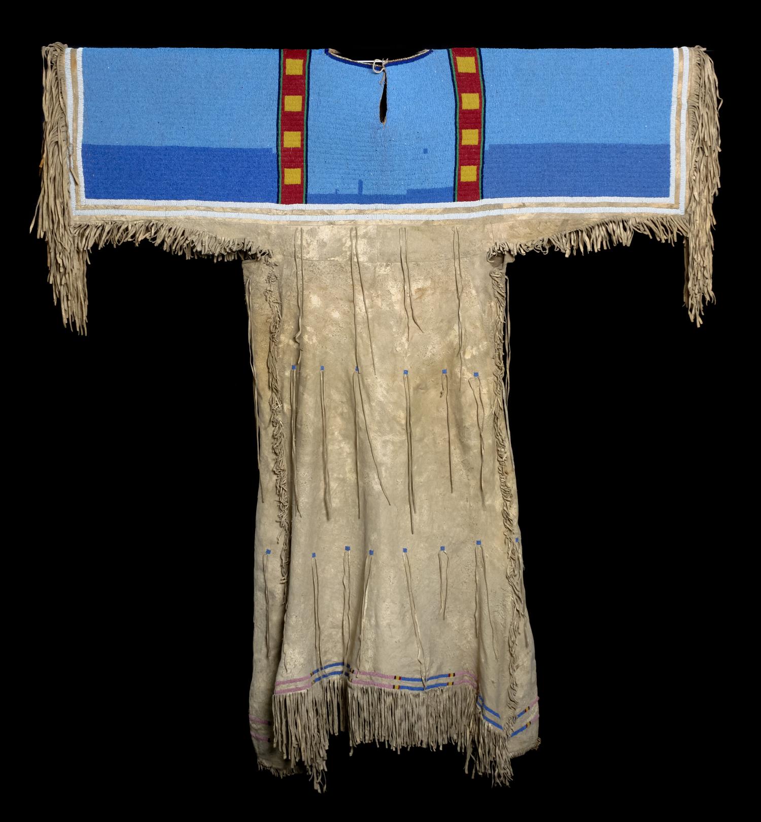 A Shoshone Beaded Hide Dress Length 55 x width 48 inches. — CIRCA 1885
