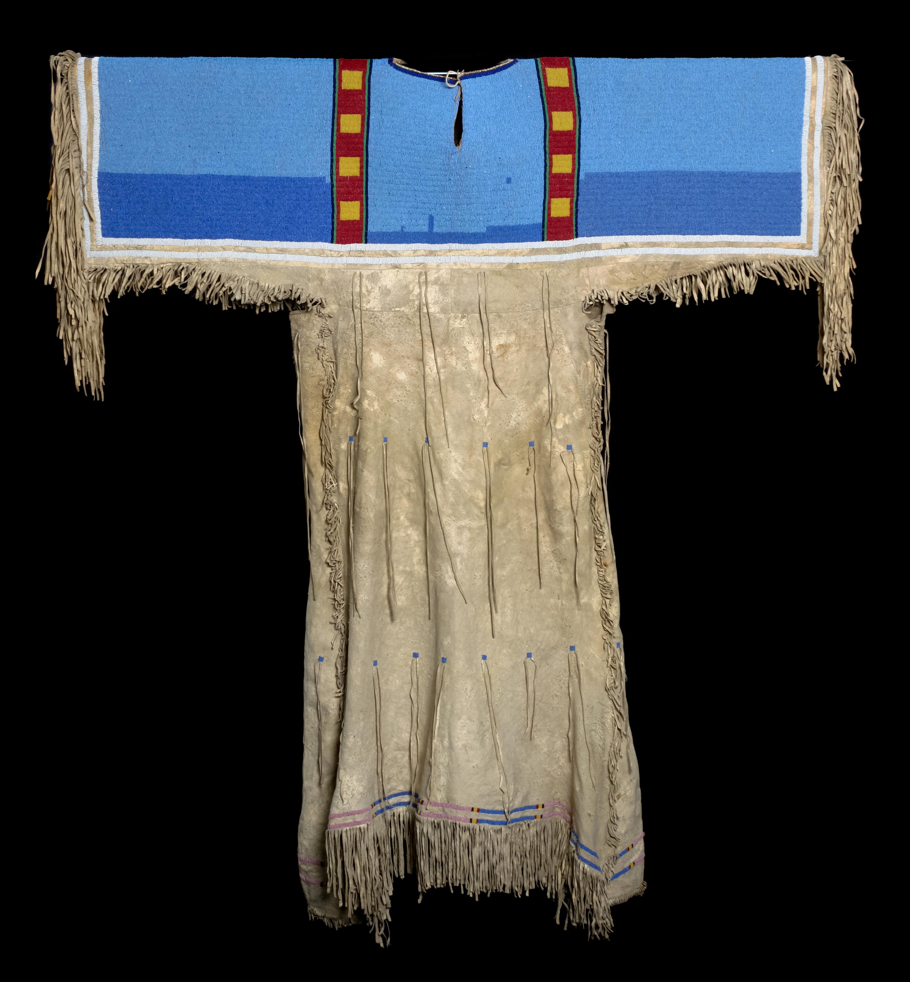 A Shoshone Beaded Hide Dress Length 55 x width 48 inches. — CIRCA 1885