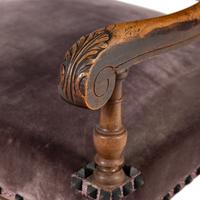 A Pair of Henry II Style Carved Fruitwood Fauteuils