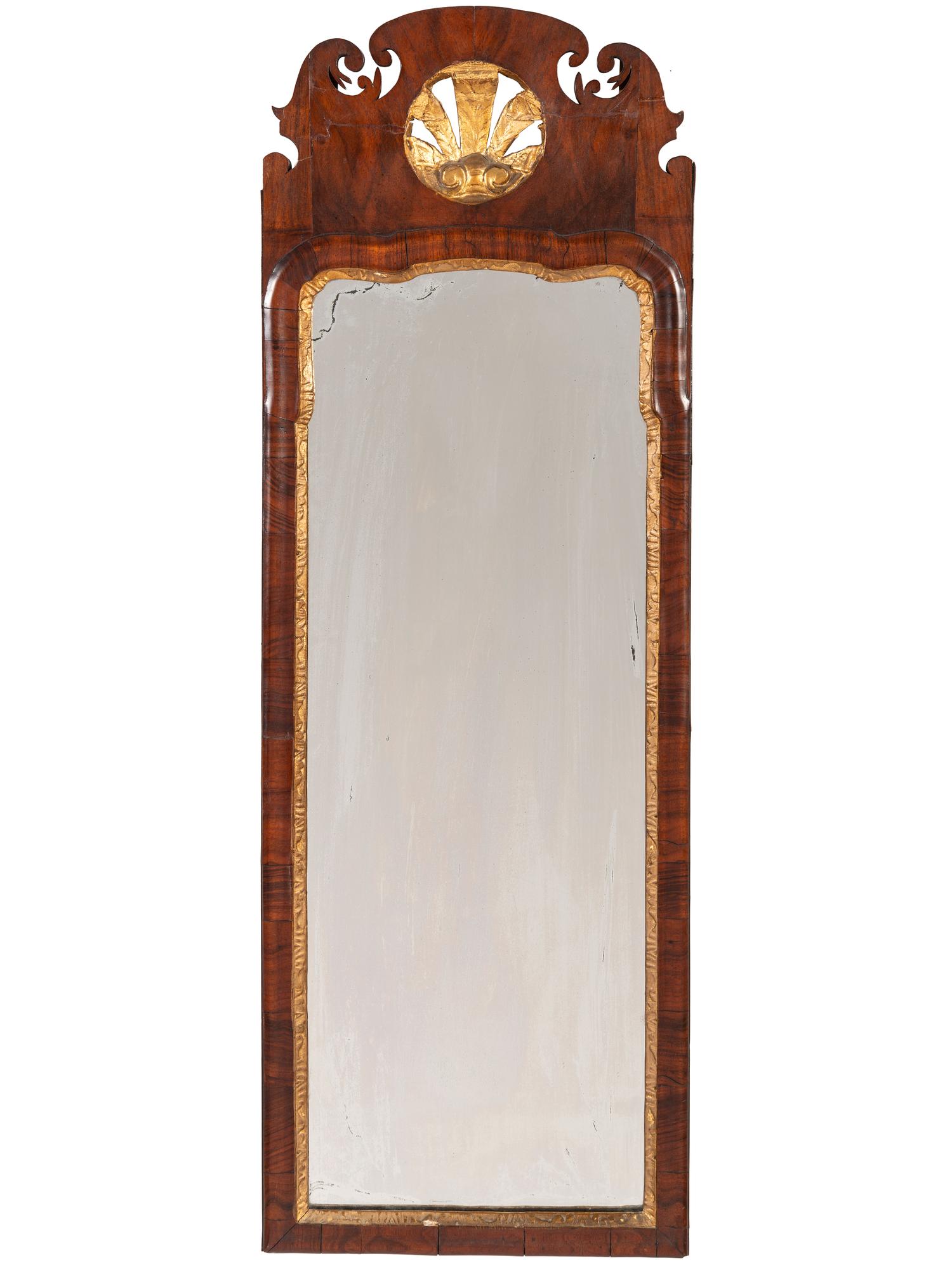 A Queen Anne Style Mahogany and Giltwood Mirror
