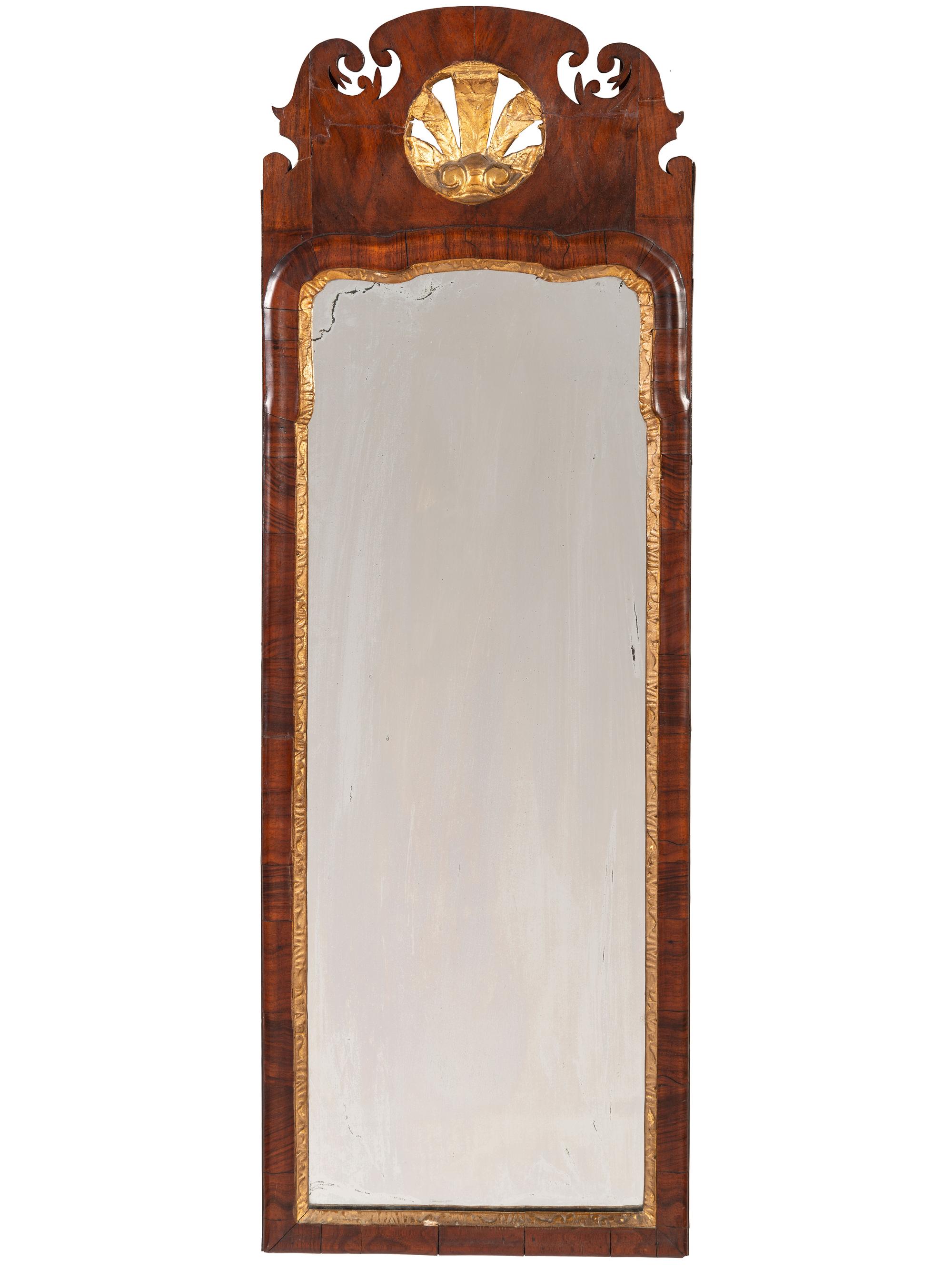A Queen Anne Style Mahogany and Giltwood Mirror