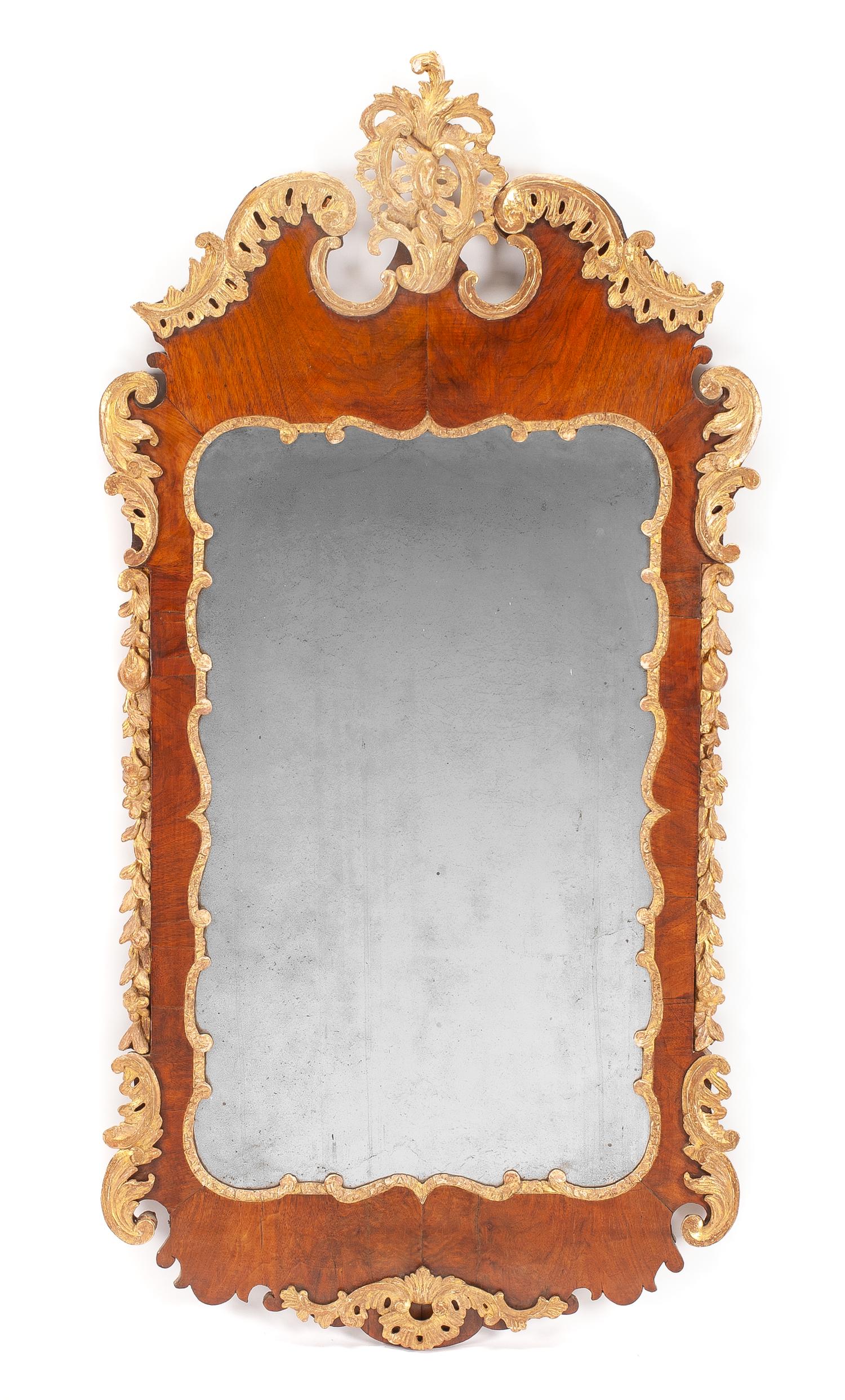 A George II Parcel Gilt Mahogany Mirror Height 50 1/2 x width 24 inches. — 18TH CENTURY