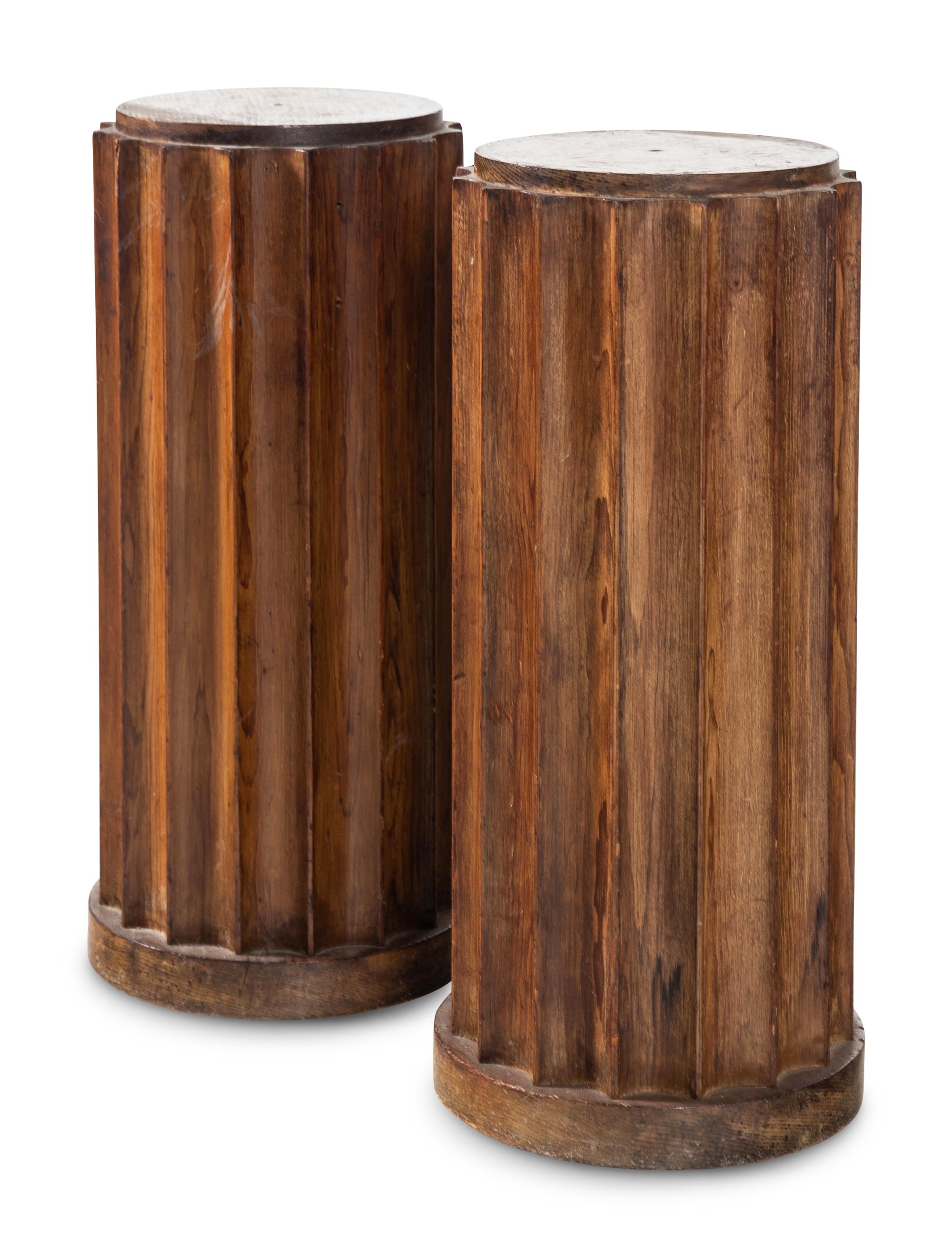 A Pair of Stained Pine Fluted Columnar Pedestals