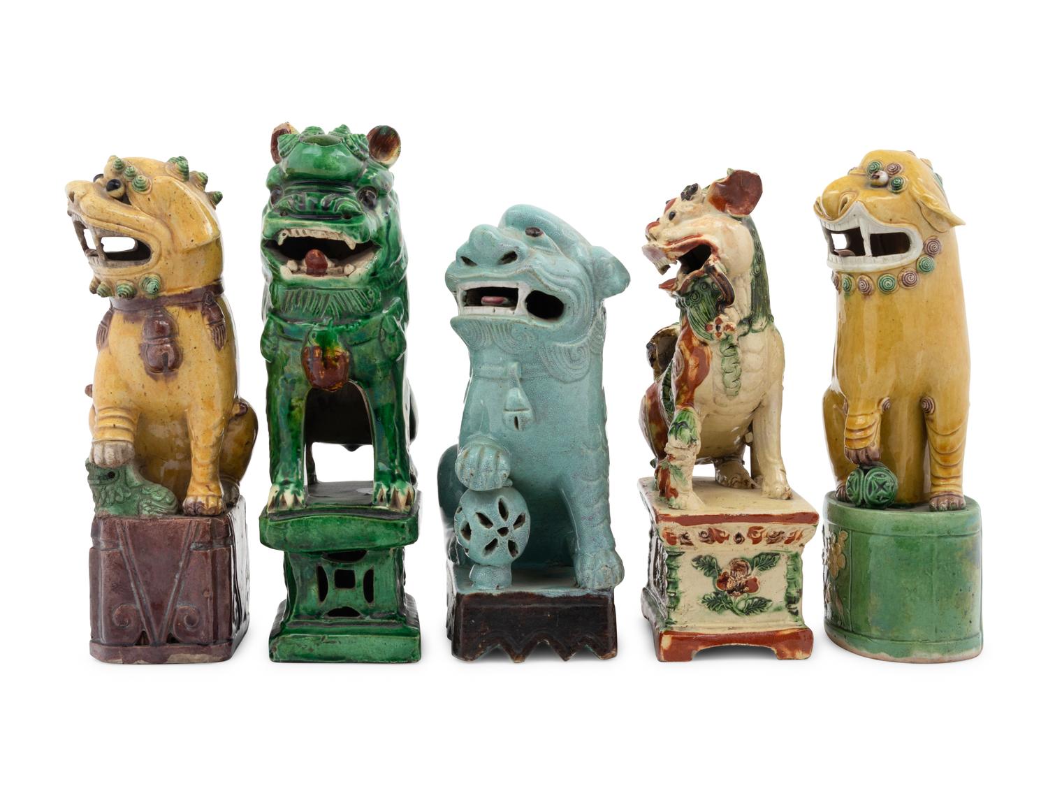 Nine Chinese Porcelain Figures of Fu Lions