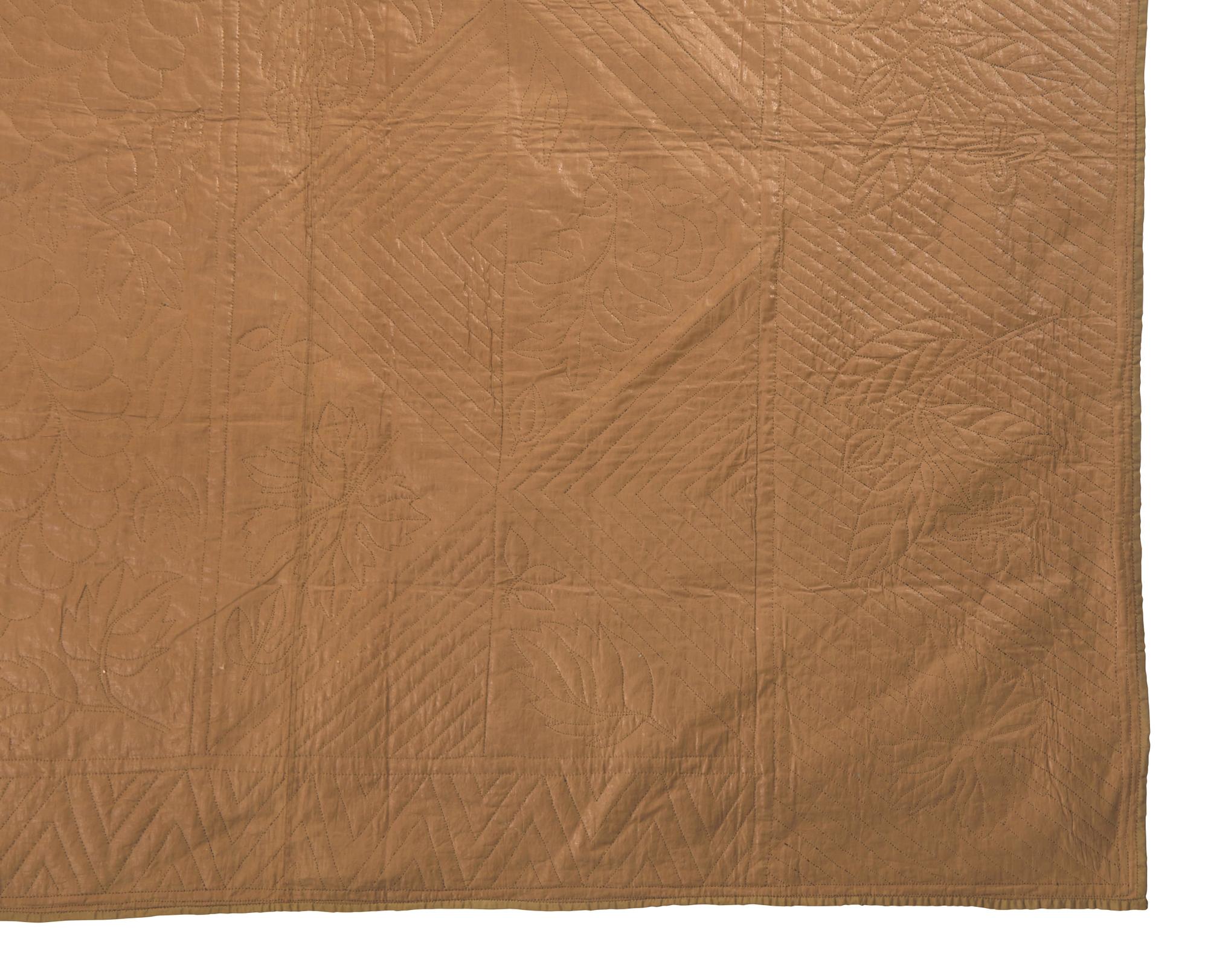 A Silk and Glazed Cotton "Square" Pattern Quilt, 19th Century