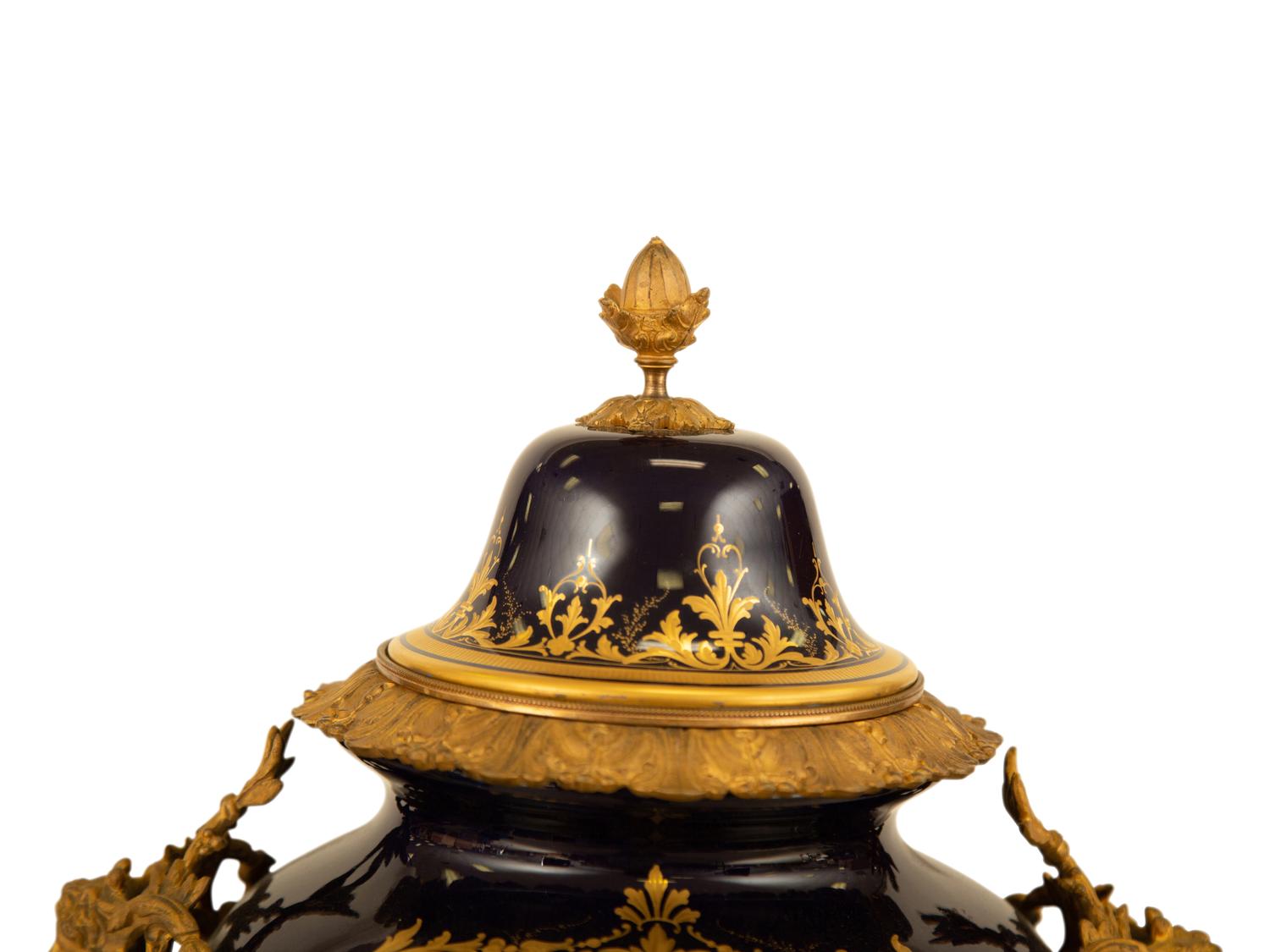 A Sèvres Style Gilt Metal Mounted Porcelain Urn and Cover