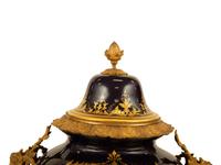 A Sèvres Style Gilt Metal Mounted Porcelain Urn and Cover