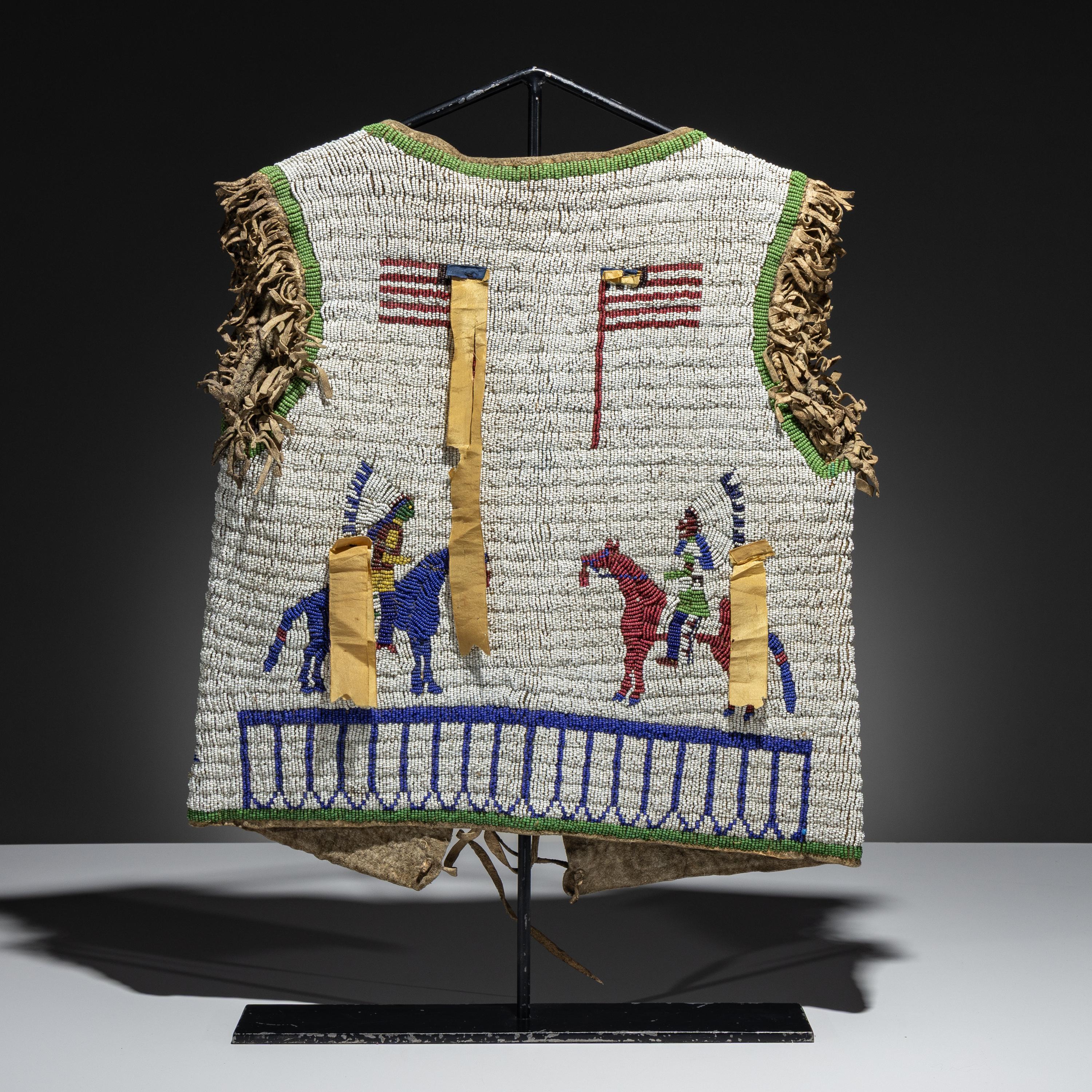Sioux Beaded Buffalo Hide Pictorial Vest, American Flags and Warriors